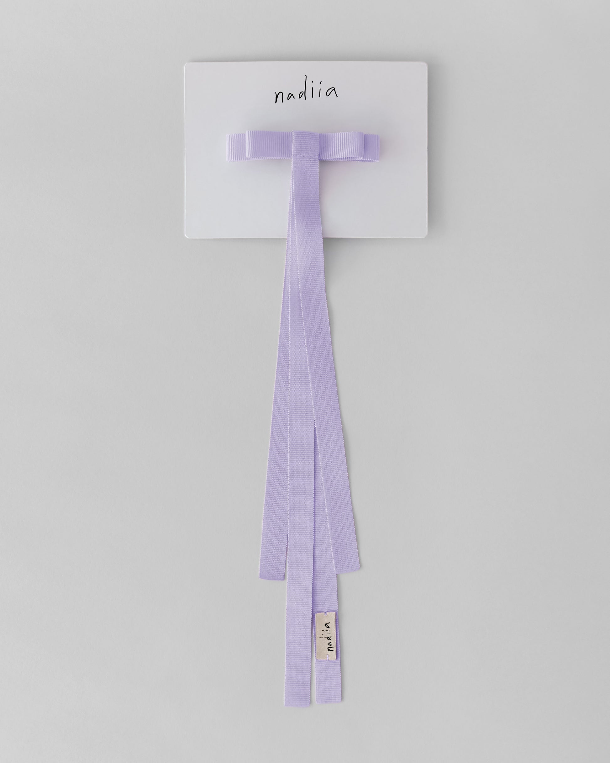 Купіть виріб ручної роботи Ribbon Barette in Lilac від Nadiia World. Ідеальний вибір для додавання вишуканості та шарму до вашого житлового простору або колекції особистих аксесуарів.