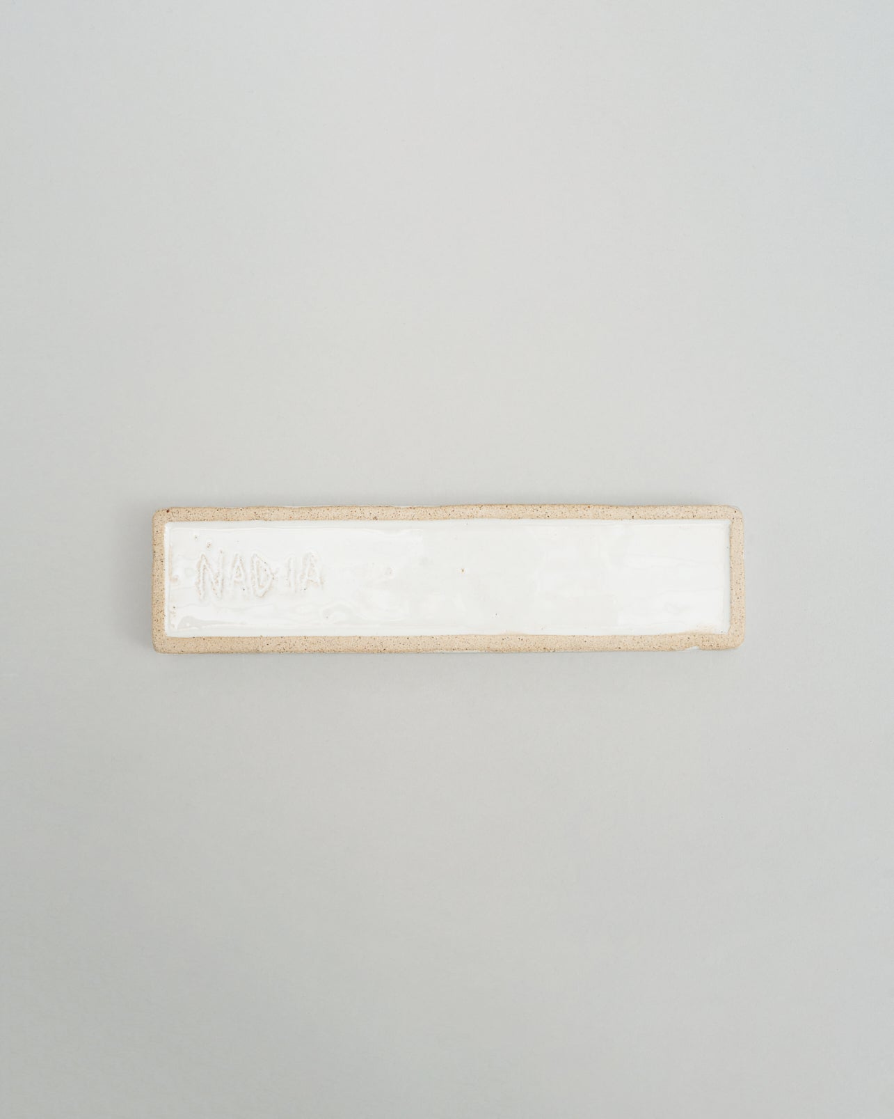 Купіть виріб ручної роботи An Eight-Arm Candle Holder in White від Nadiia World. Ідеальний вибір для додавання вишуканості та шарму до вашого житлового простору або колекції особистих аксесуарів.