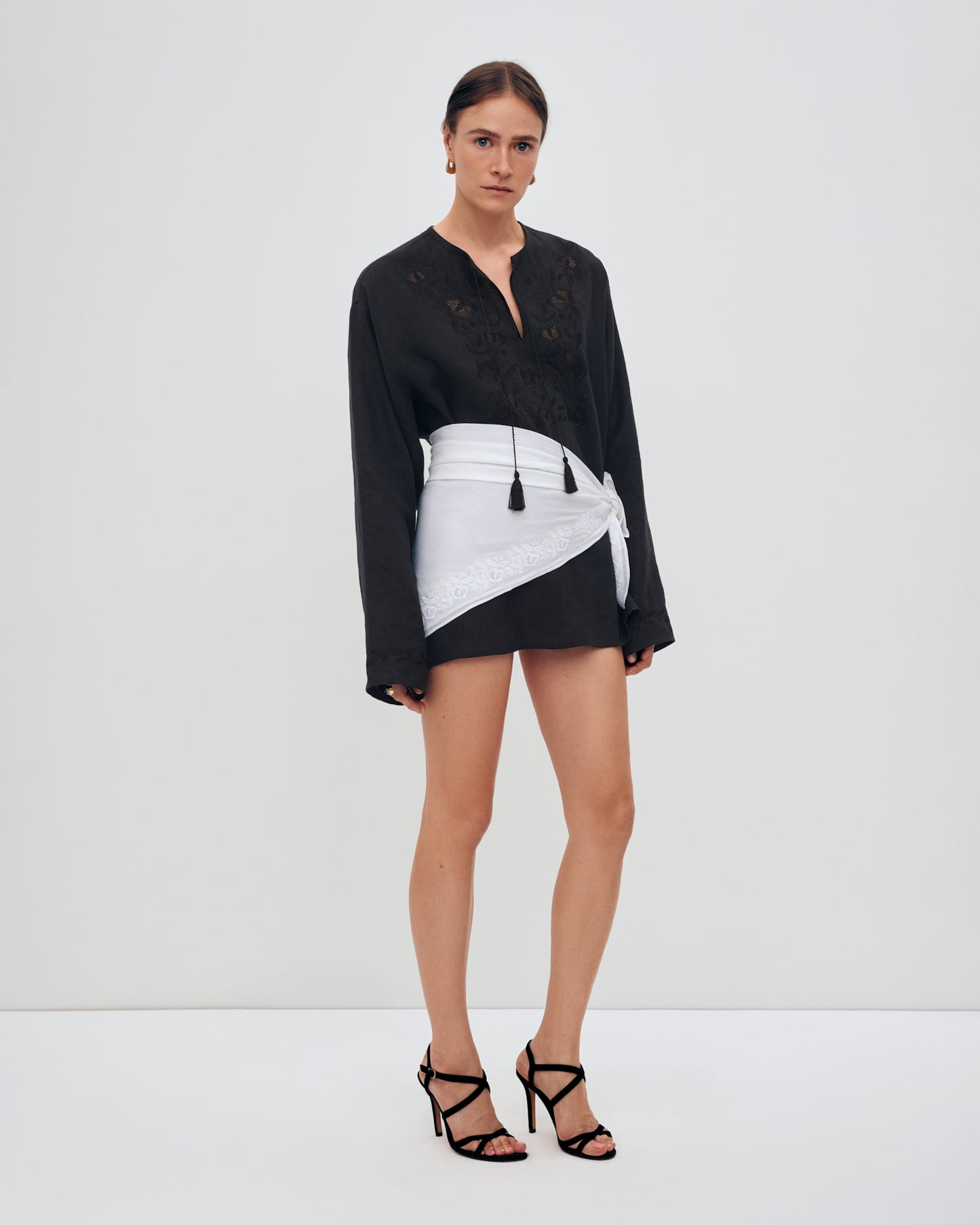 Купіть виріб ручної роботи Embroidered shirt Babylon XX in Black від Nadiia World. Ідеальний вибір для додавання вишуканості та шарму до вашого житлового простору або колекції особистих аксесуарів.