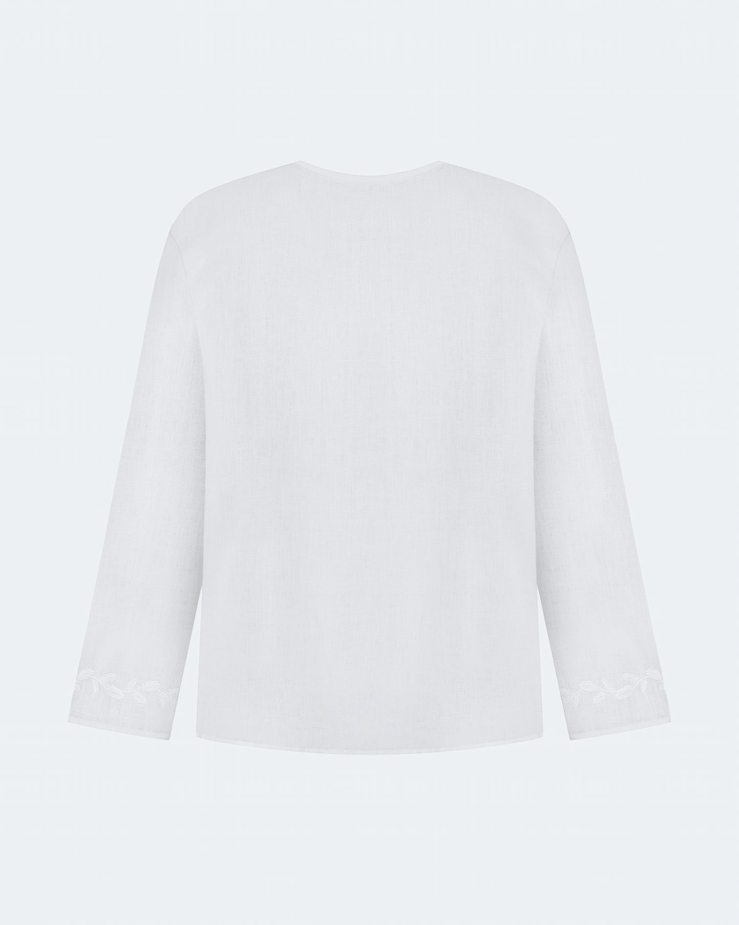 Купіть виріб ручної роботи Embroidered shirt Babylon XX in White від Nadiia World. Ідеальний вибір для додавання вишуканості та шарму до вашого житлового простору або колекції особистих аксесуарів.