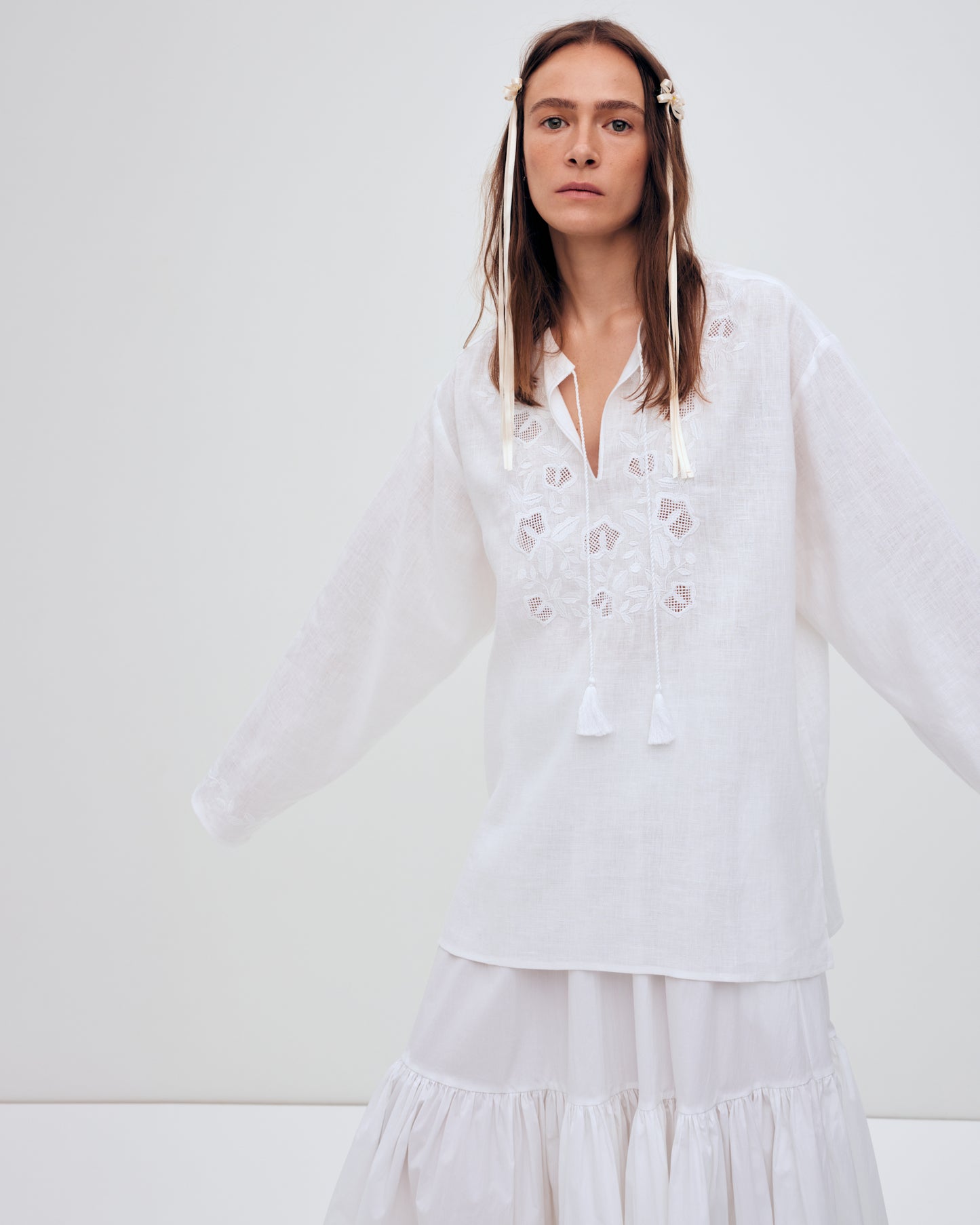 Купіть виріб ручної роботи Embroidered shirt Babylon XX in White від Nadiia World. Ідеальний вибір для додавання вишуканості та шарму до вашого житлового простору або колекції особистих аксесуарів.