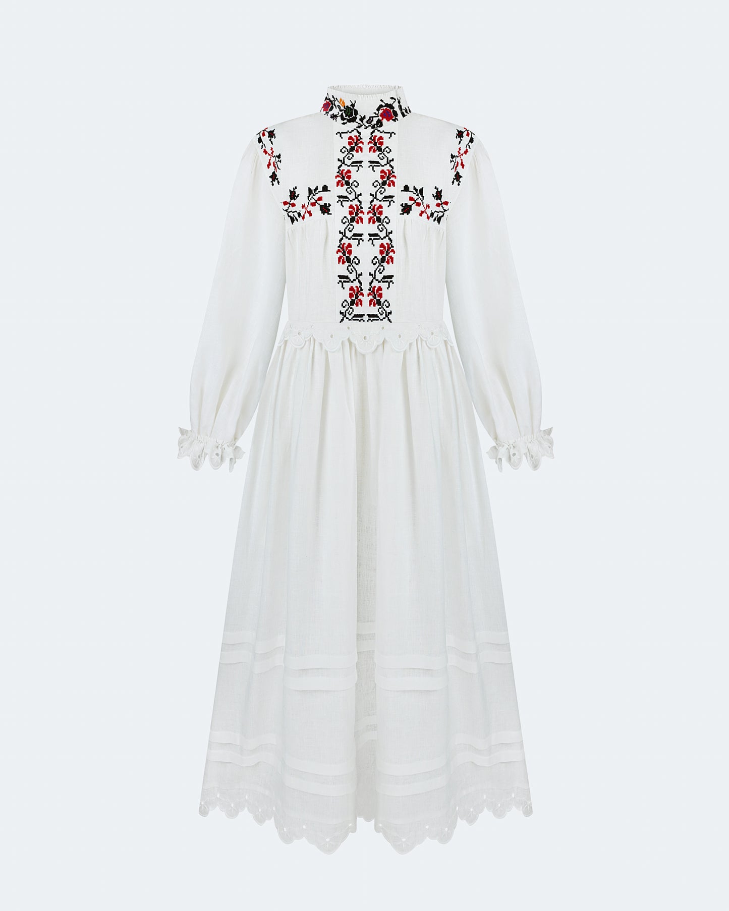 Купіть виріб ручної роботи Long embroidered dress with a high neck "Korolivna" від Nadiia World. Ідеальний вибір для додавання вишуканості та шарму до вашого житлового простору або колекції особистих аксесуарів.