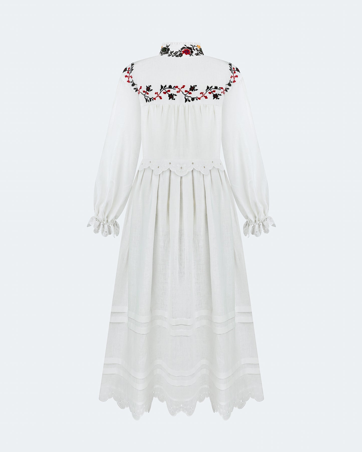 Купіть виріб ручної роботи Long embroidered dress with a high neck "Korolivna" від Nadiia World. Ідеальний вибір для додавання вишуканості та шарму до вашого житлового простору або колекції особистих аксесуарів.