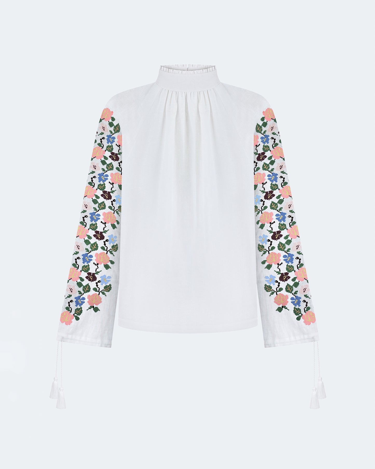 Купіть виріб ручної роботи Embroidered shirt "Bouquet" від Nadiia World. Ідеальний вибір для додавання вишуканості та шарму до вашого житлового простору або колекції особистих аксесуарів.