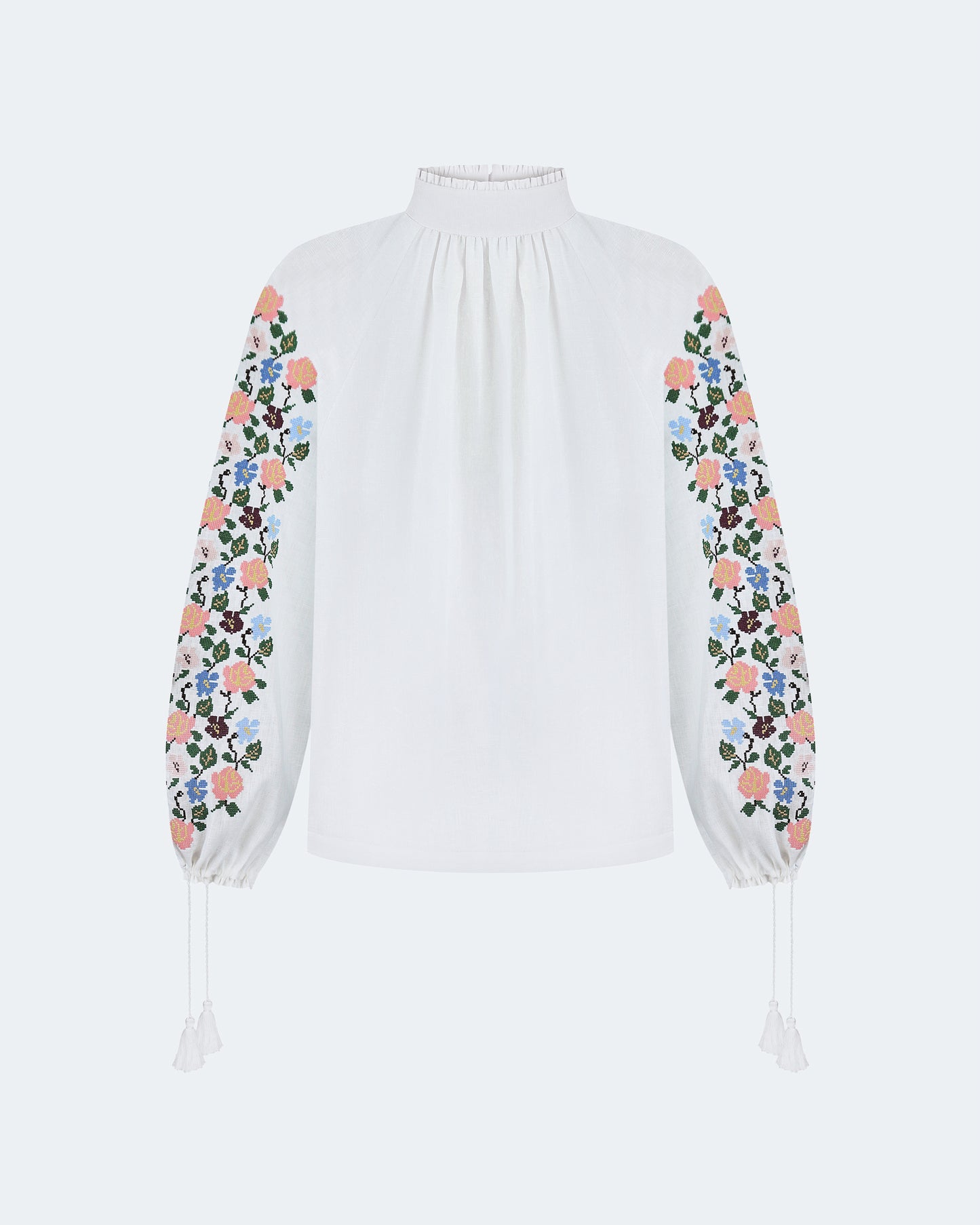 Купіть виріб ручної роботи Embroidered shirt "Bouquet" від Nadiia World. Ідеальний вибір для додавання вишуканості та шарму до вашого житлового простору або колекції особистих аксесуарів.