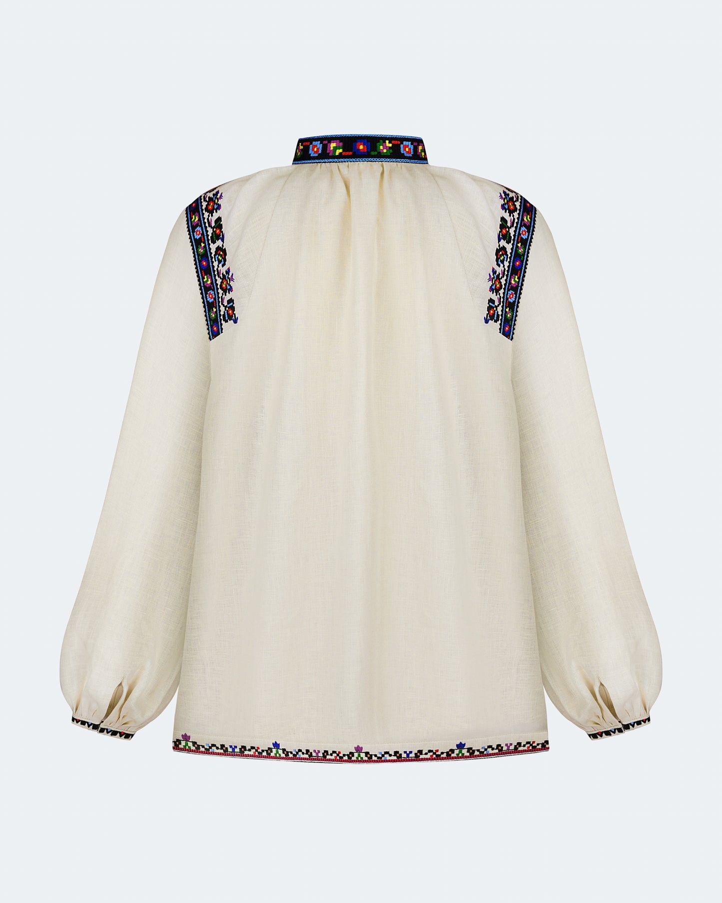 Купіть виріб ручної роботи Women's embroidered shirt "Olga" від Nadiia World. Ідеальний вибір для додавання вишуканості та шарму до вашого житлового простору або колекції особистих аксесуарів.