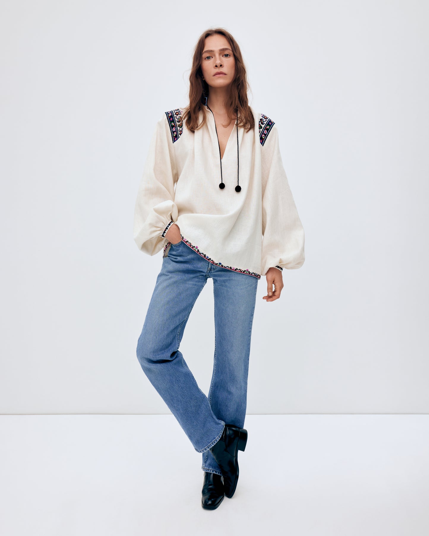 Купіть виріб ручної роботи Women's embroidered shirt "Olga" від Nadiia World. Ідеальний вибір для додавання вишуканості та шарму до вашого житлового простору або колекції особистих аксесуарів.