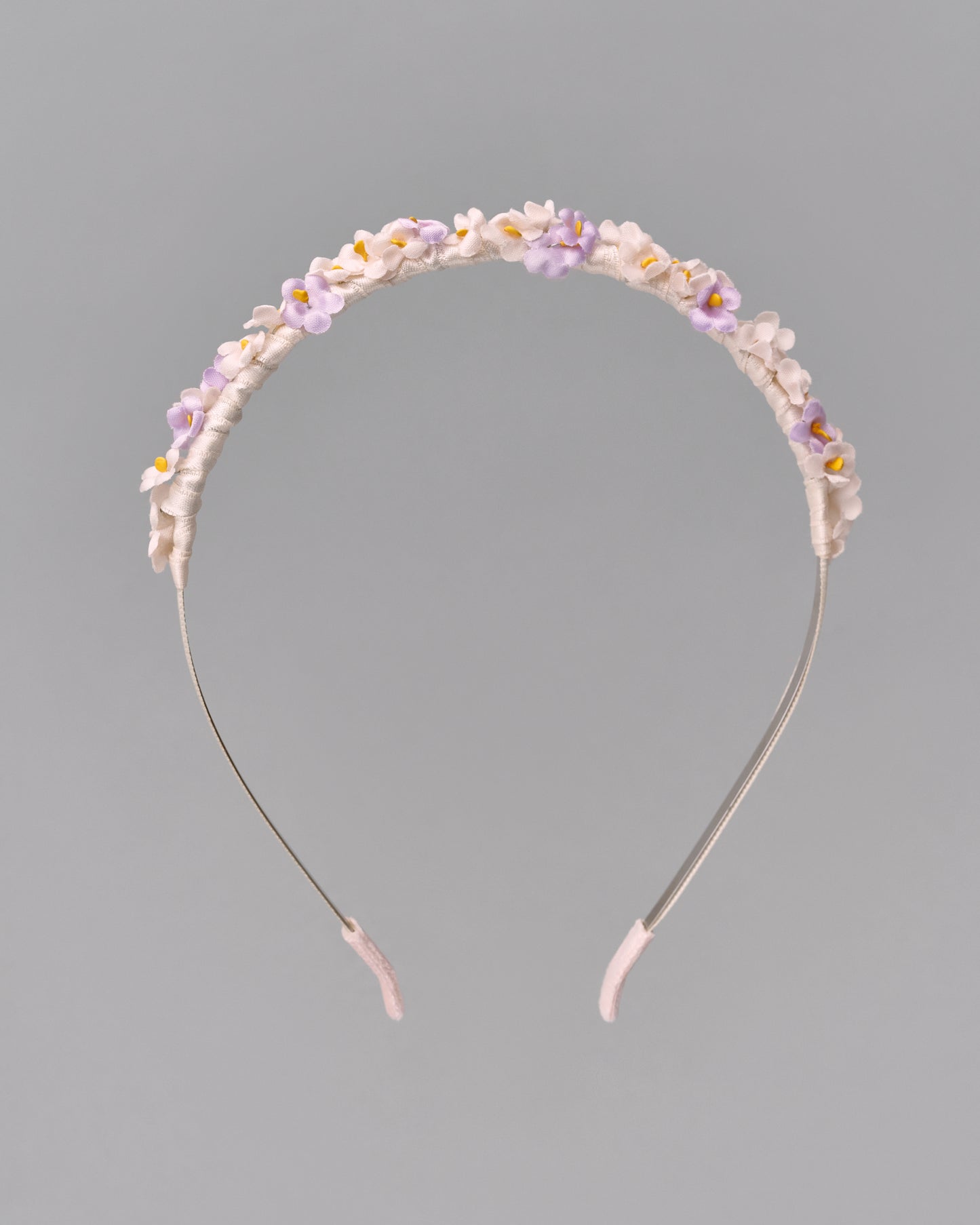 Купіть виріб ручної роботи Flower hairband "Tsarivna" in “Lilac” від Nadiia World. Ідеальний вибір для додавання вишуканості та шарму до вашого житлового простору або колекції особистих аксесуарів.