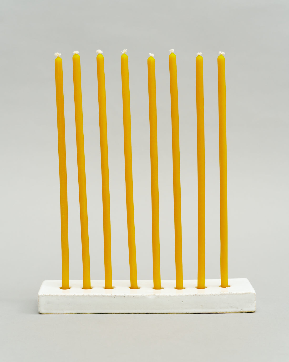 An Eight-Arm Candle Holder in White