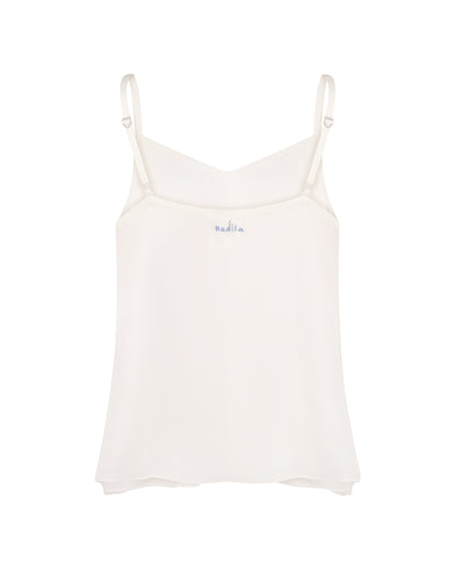 Купіть виріб ручної роботи Silk Camisole “Love” від Nadiia World. Ідеальний вибір для додавання вишуканості та шарму до вашого житлового простору або колекції особистих аксесуарів.