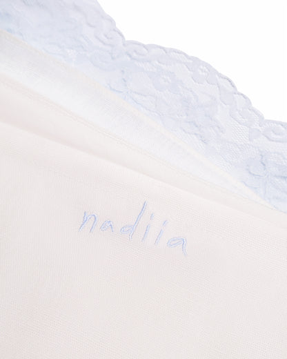 Купіть виріб ручної роботи Linen Shorts with Blue Lace “Baby Doll” від Nadiia World. Ідеальний вибір для додавання вишуканості та шарму до вашого житлового простору або колекції особистих аксесуарів.