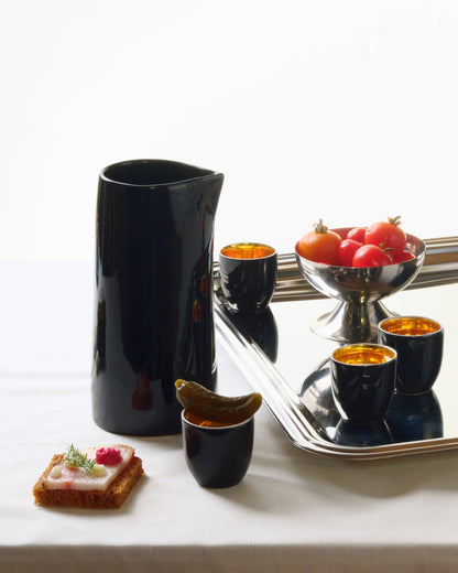 Купіть виріб ручної роботи Set of 4 shot glasses “I Drink to You” Black від Nadiia World. Ідеальний вибір для додавання вишуканості та шарму до вашого житлового простору або колекції особистих аксесуарів.