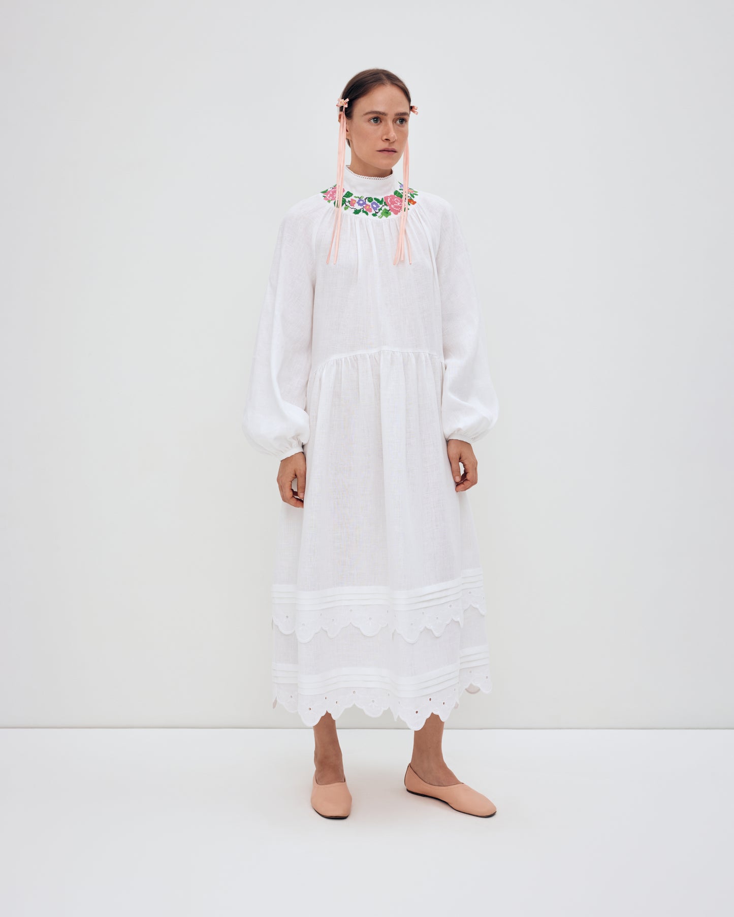 Купіть виріб ручної роботи Long embroidered dress with fastening "Vinok" від Nadiia World. Ідеальний вибір для додавання вишуканості та шарму до вашого житлового простору або колекції особистих аксесуарів.