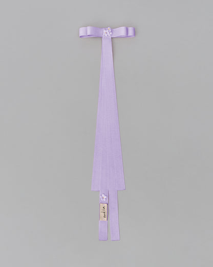 Купіть виріб ручної роботи Ribbon Barrette with flowers "Lilac" від Nadiia World. Ідеальний вибір для додавання вишуканості та шарму до вашого житлового простору або колекції особистих аксесуарів.