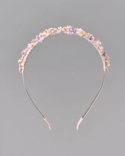 Купіть виріб ручної роботи Flower hairband "Tsarivna" in “Lilac” від Nadiia World. Ідеальний вибір для додавання вишуканості та шарму до вашого житлового простору або колекції особистих аксесуарів.