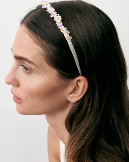 Купіть виріб ручної роботи Flower hairband "Tsarivna" in “Lilac” від Nadiia World. Ідеальний вибір для додавання вишуканості та шарму до вашого житлового простору або колекції особистих аксесуарів.