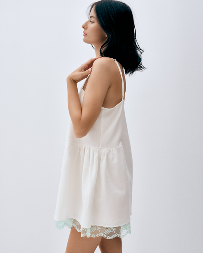 Купіть виріб ручної роботи Linen Dress with Mentol Lace “Baby Doll” від Nadiia World. Ідеальний вибір для додавання вишуканості та шарму до вашого житлового простору або колекції особистих аксесуарів.