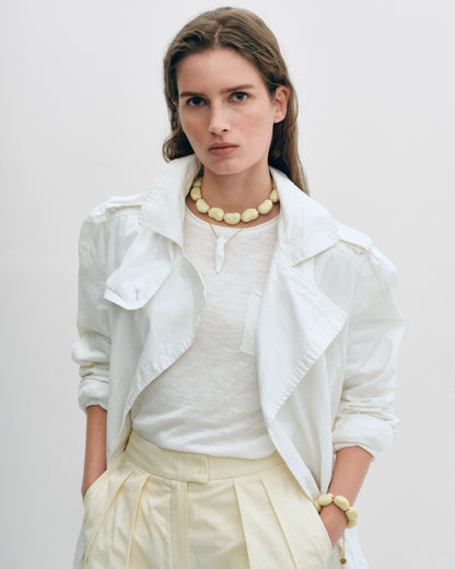 Купіть виріб ручної роботи Yellow Speckled "Beans" Bracelet від Nadiia World. Ідеальний вибір для додавання вишуканості та шарму до вашого житлового простору або колекції особистих аксесуарів.