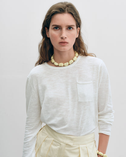 Купіть виріб ручної роботи Yellow "Beans" Necklace від Nadiia World. Ідеальний вибір для додавання вишуканості та шарму до вашого житлового простору або колекції особистих аксесуарів.