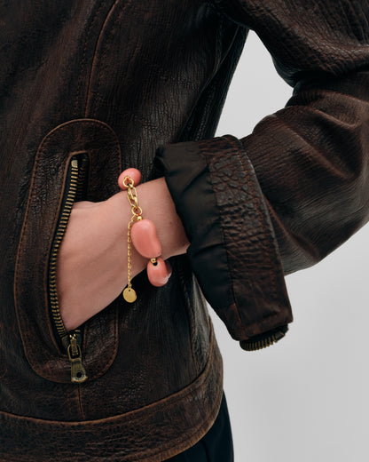 Купіть виріб ручної роботи Pink "Beans" Bracelet від Nadiia World. Ідеальний вибір для додавання вишуканості та шарму до вашого житлового простору або колекції особистих аксесуарів.