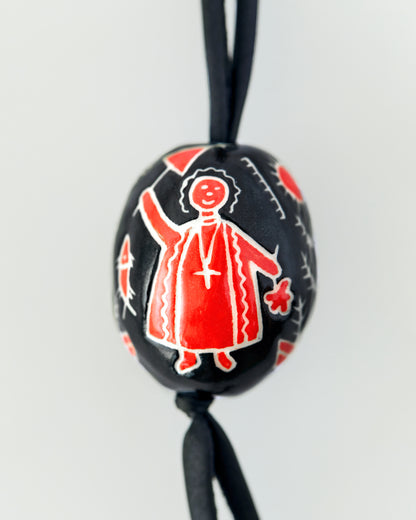 Купіть виріб ручної роботи Bag charm “Black and Red Pysanka” від Nadiia World. Ідеальний вибір для додавання вишуканості та шарму до вашого житлового простору або колекції особистих аксесуарів.