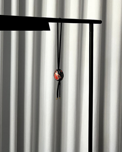 Купіть виріб ручної роботи Bag charm “Black and Red Pysanka” від Nadiia World. Ідеальний вибір для додавання вишуканості та шарму до вашого житлового простору або колекції особистих аксесуарів.