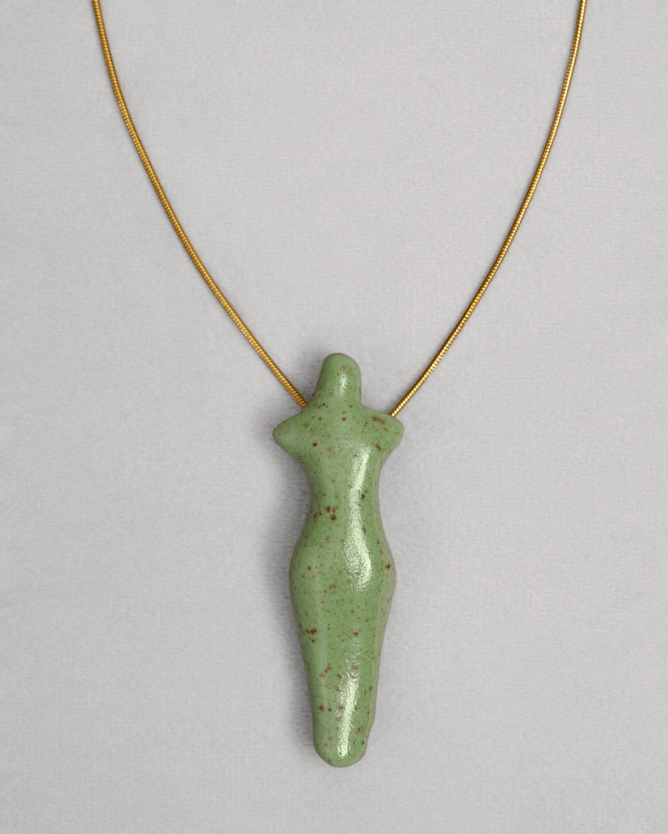 Porcelain Oranta pendant with a gold chain in Green