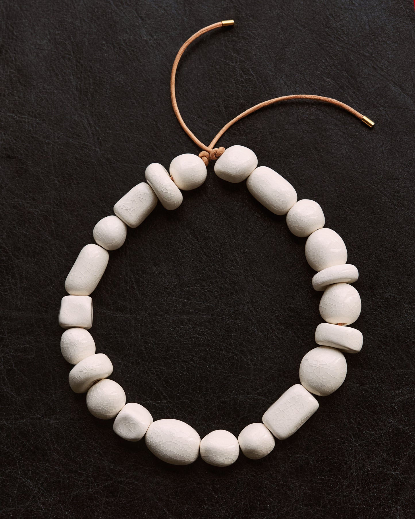 Necklace with white ceramic beads