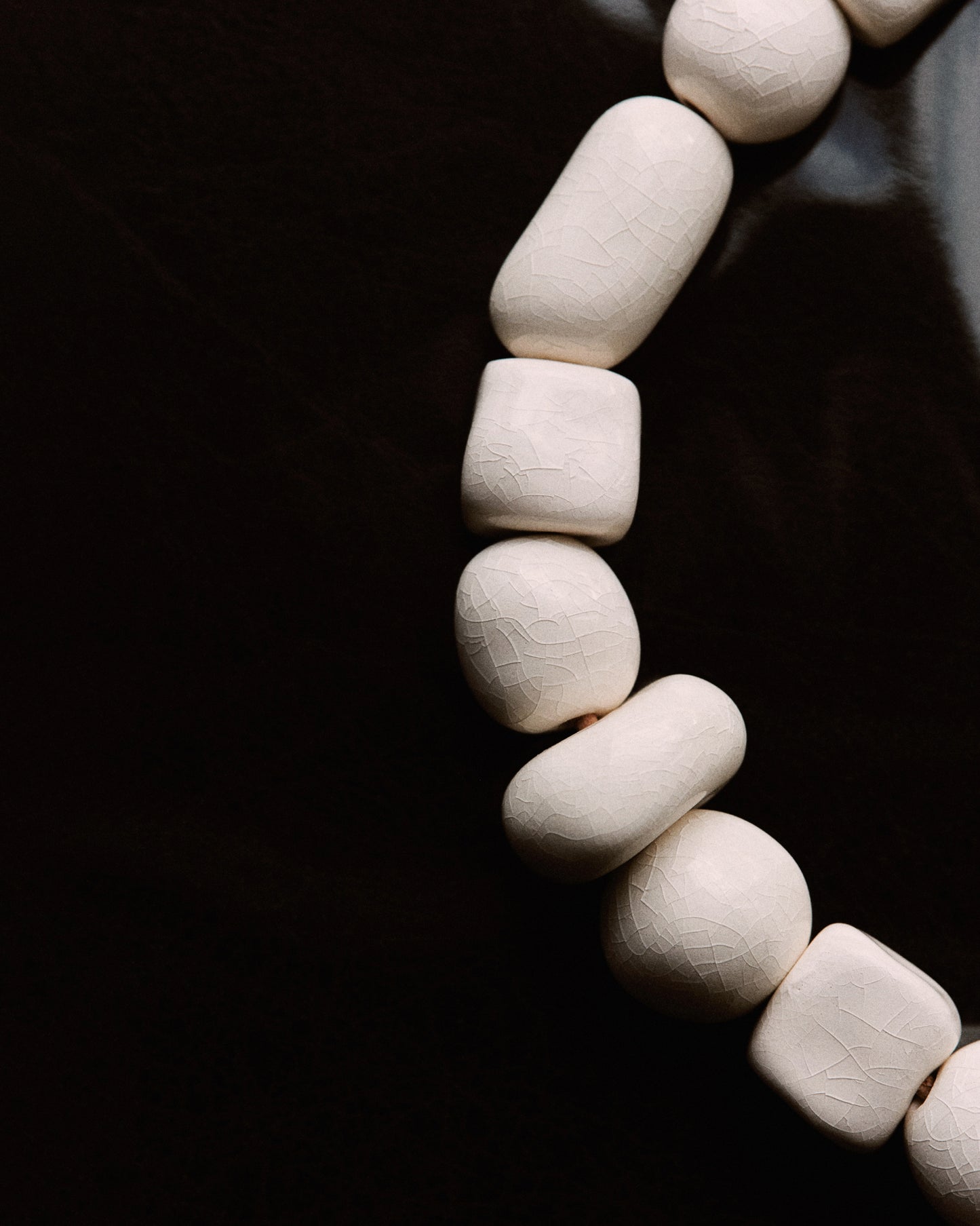 Necklace with white ceramic beads