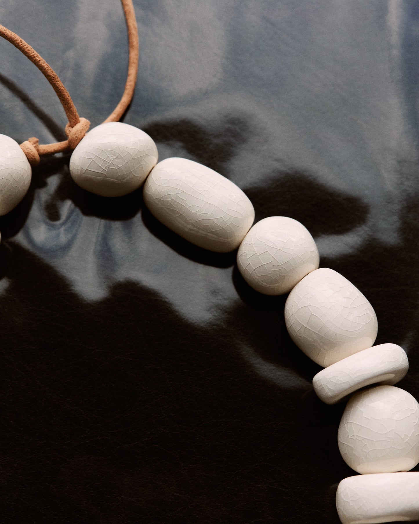 Necklace with white ceramic beads