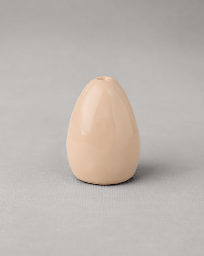 Купіть виріб ручної роботи Candlestick Egg Peach від Nadiia World. Ідеальний вибір для додавання вишуканості та шарму до вашого житлового простору або колекції особистих аксесуарів.
