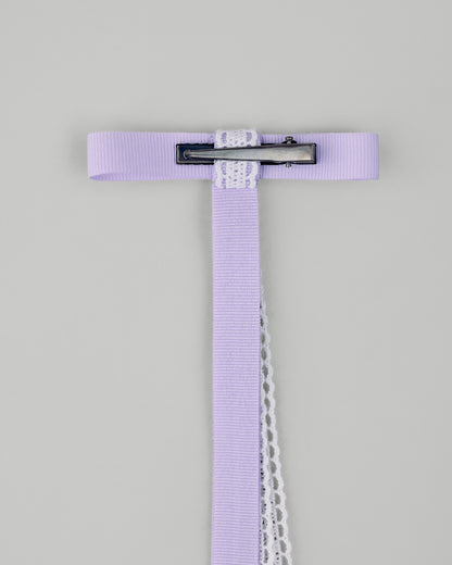 Купіть виріб ручної роботи Lilac Lace Ribbon Barrette від Nadiia World. Ідеальний вибір для додавання вишуканості та шарму до вашого житлового простору або колекції особистих аксесуарів.